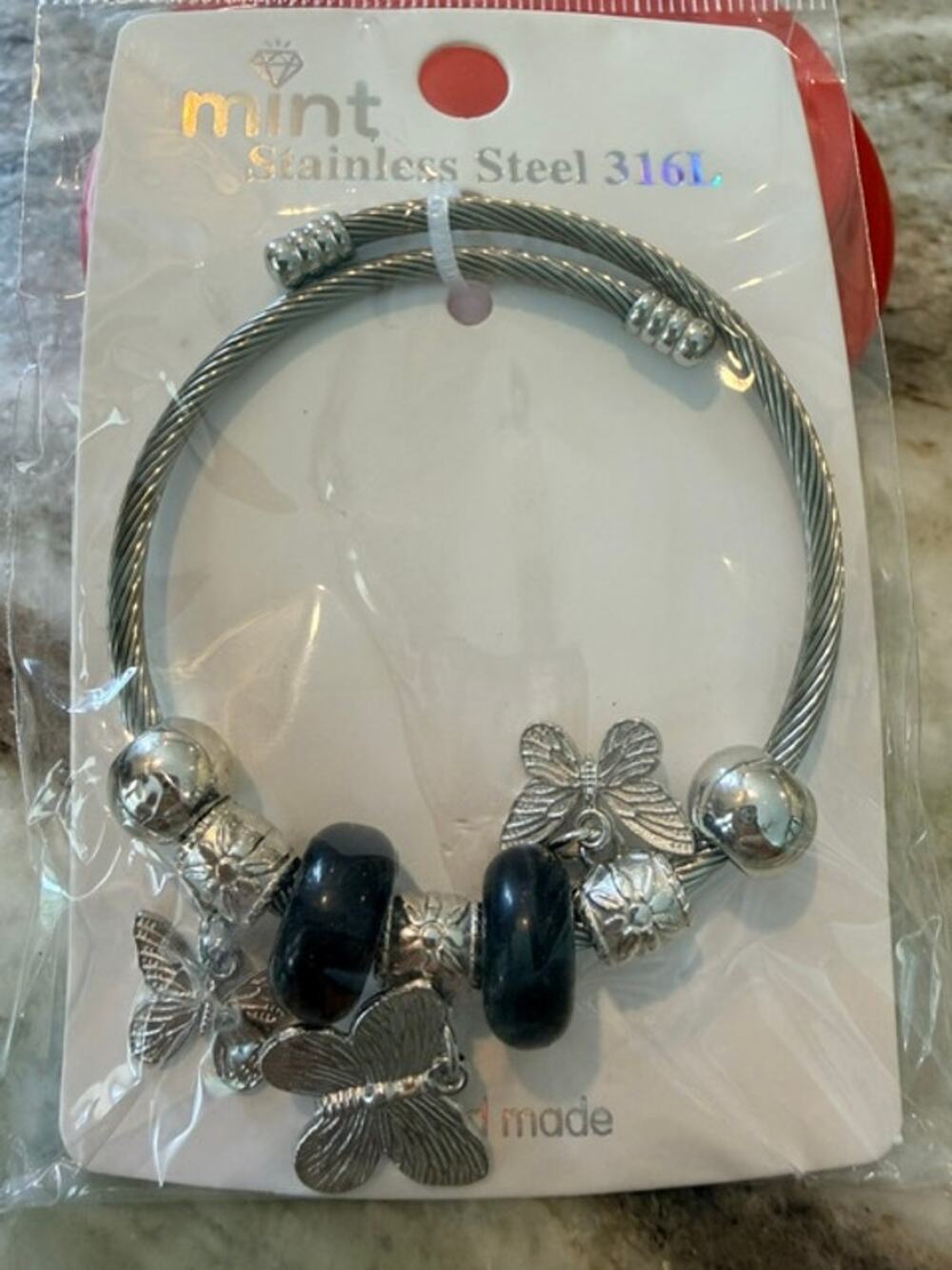 The "Montserratt" Flutter Charm Bracelet - Stainless Steel and Adjustable